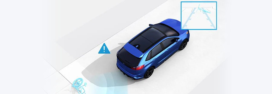 Ford Driver Assist - Rear View Camera Ford SUV scanning curb behind it as it backs up