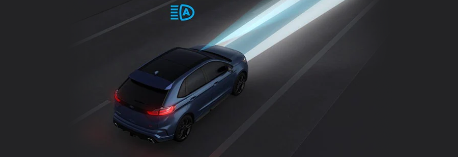 Ford Driver Assist - Auto High-Beam Headlamps Ford SUV with highbeams on