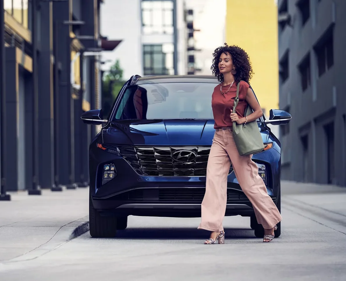 Woman Walking in Front of Hyundai vehicle
