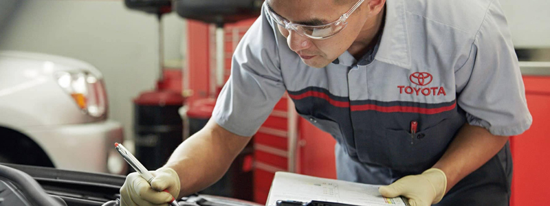 5,000 Mile Full Service Special Technician Going Over Vehicle Checklist