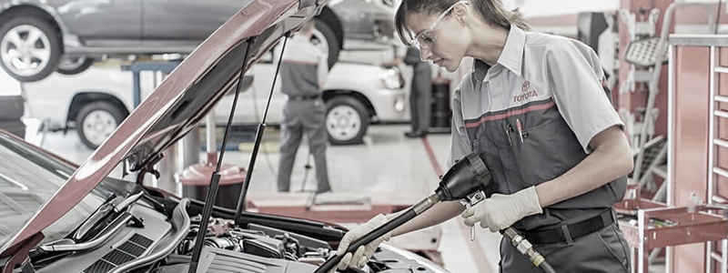 Spend and Save Toyota Service Technician working on vehicle