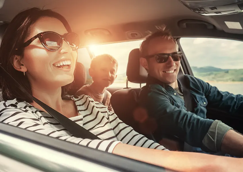 California Clean Fuel Reward happy family driving in the car with a sunset