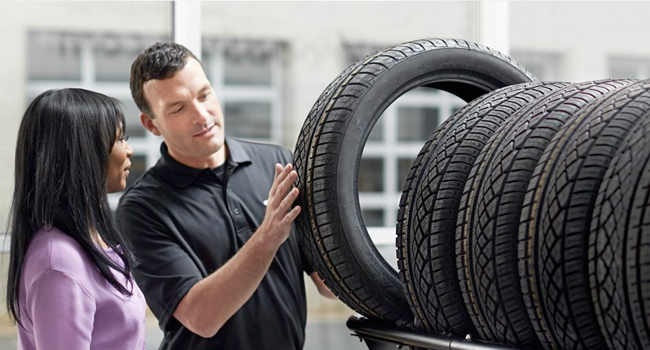Tire Savings Customer choosing a Tire Set