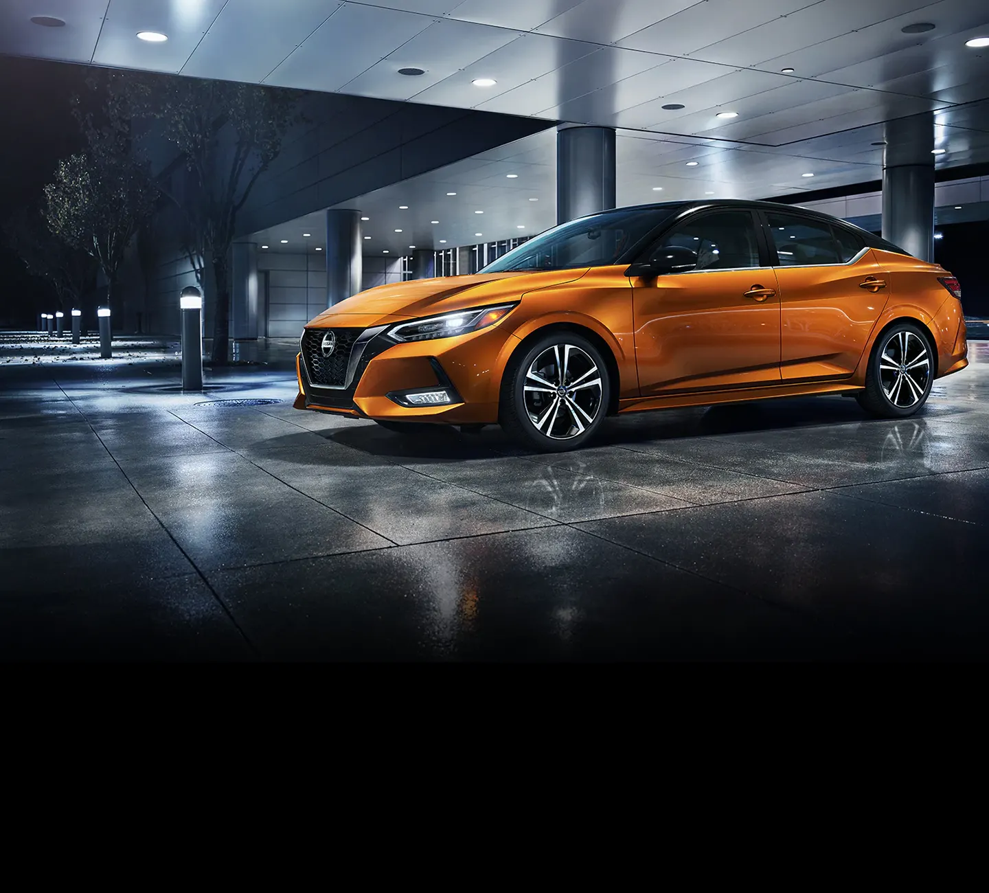 Nissan Senta sitting outside building at night