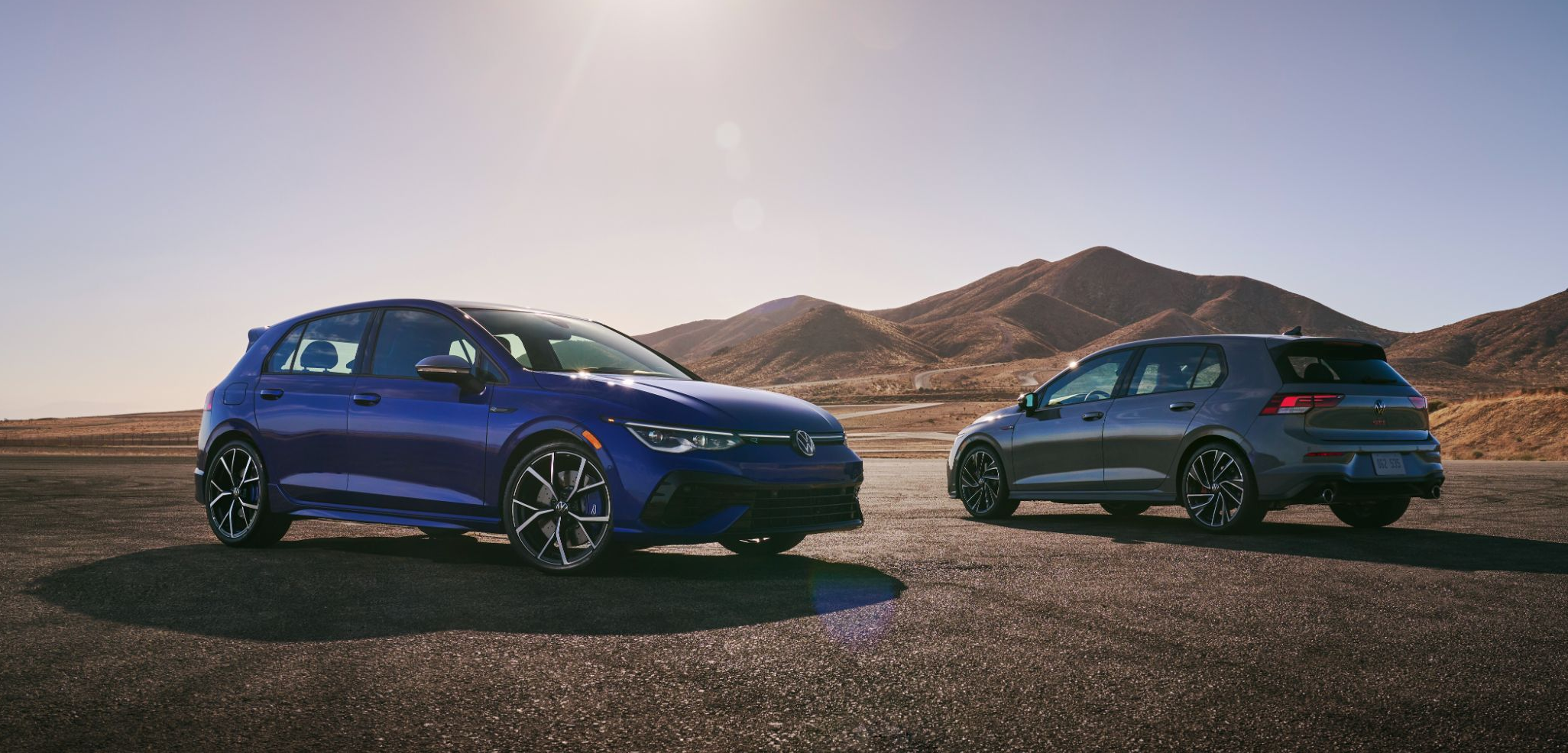 2021 VW Golf and Golf GTI parked in the desert