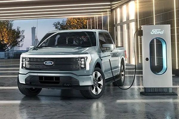 Ford F-150 Lightning All-Electric plugged in to charger