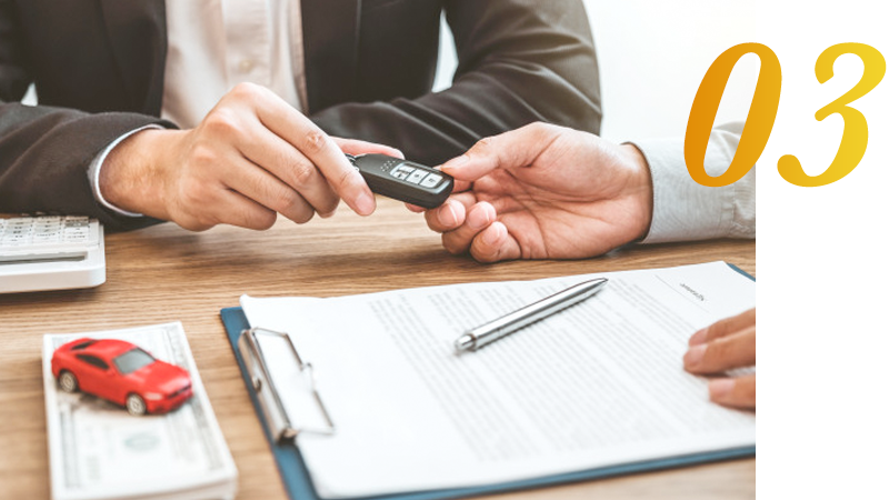 Sales Person handing keys to customer
