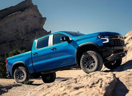 Chevy Silvarado clibming rocks
