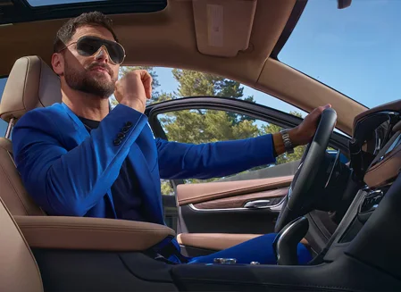 Man inside Cadillac