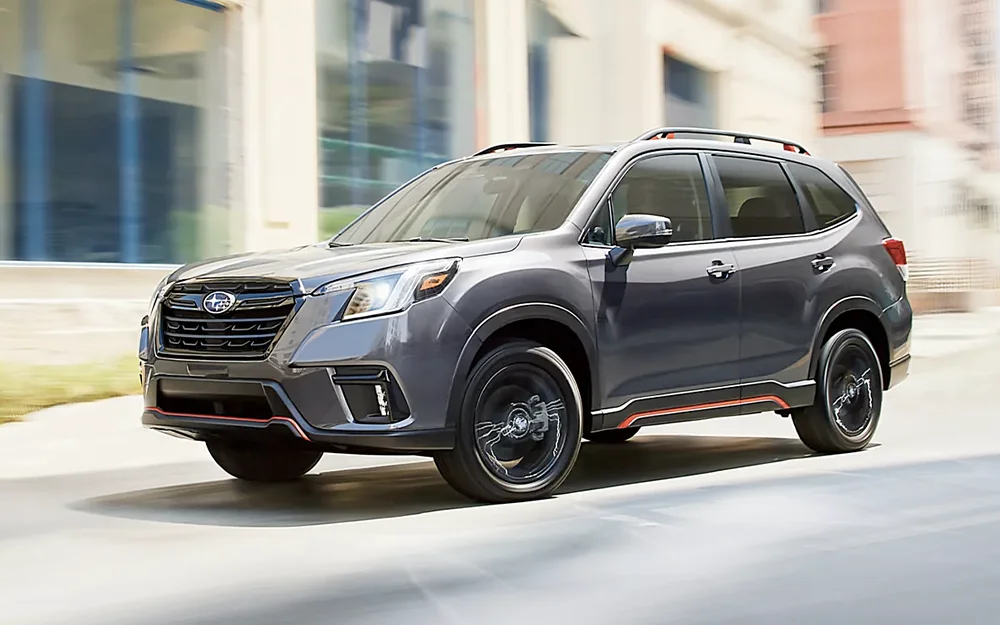Subaru Forester Driving Down Street