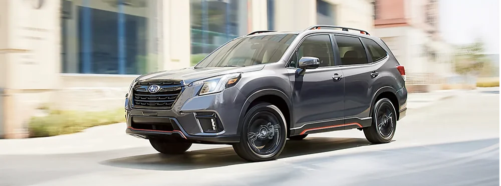 Subaru Forester Driving Down Street